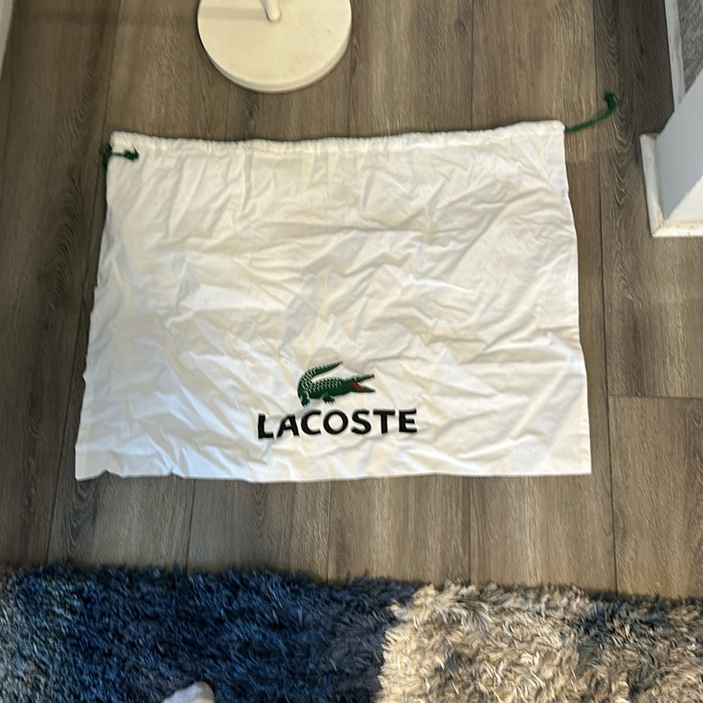 Lacoste 2x2.5 foot duster bag with draw stings